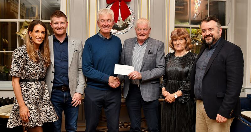 Bill Cuddihy, Chairman of the Cois Nore Cancer Support Centre, receives a cheque for €3,500 from Richie Power Snr from the proceeds of ‘Power, A Family Memoir’. Also pictured are Maria Connolly, Richie Power Jnr, Ann Power and Dermot Keyes (author of the book).