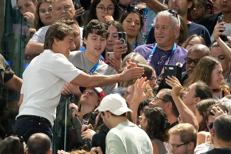 Actor Tom Cruise was mobbed by fans (Charlie Riedel/AP)