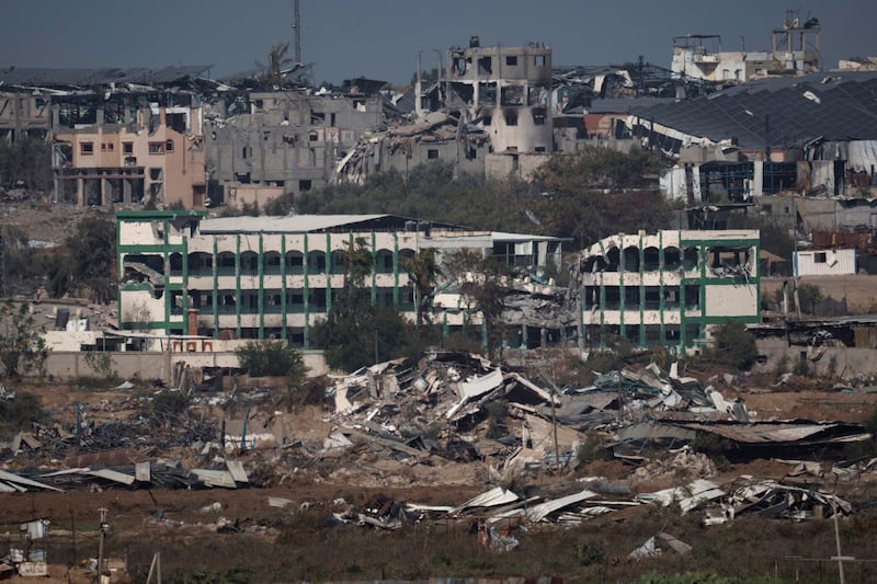 Destroyed farms and buildings in the Gaza Strip as seen from Southern Israel (AP Photo/Leo Correa)