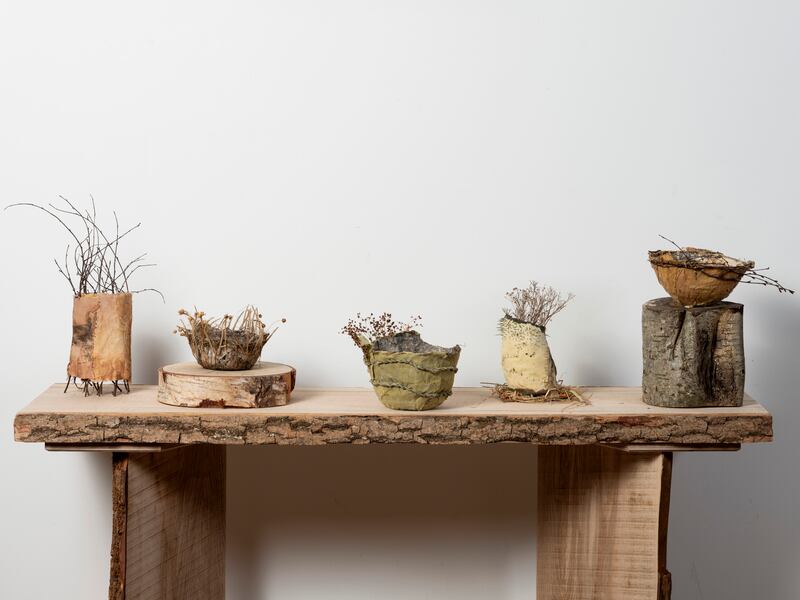 Ruth Osborne’s handmade Linen earth vessels constructed from Irish linen sitting on wooden bench