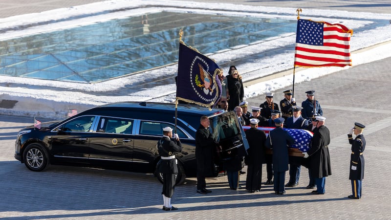 The flag-draped casket of former president Jimmy Carter (Shawn Thew/Pool via AP)