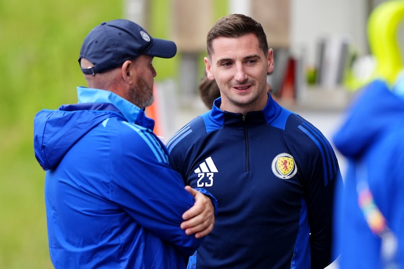 Kenny McLean (right) hopes to keep himself firmly in Steve Clarke’s plans