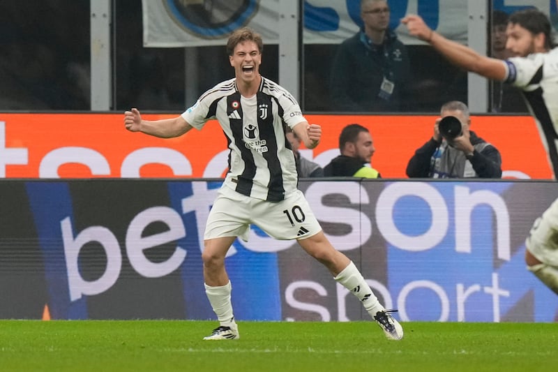 Kenan Yildaz celebrates his late equaliser in Juventus’ thrilling 4-4 draw with Inter Milan (Luca Bruno/AP)