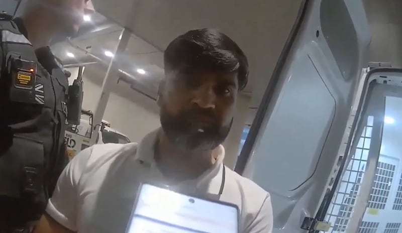 A screen grab from bodycam footage of the arrest of Sara Sharif’s father Urfan Sharif at Gatwick Airport