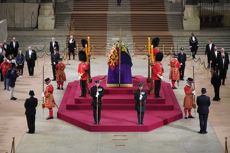 Members of the public pay their respects at the coffin of Queen Elizabeth II