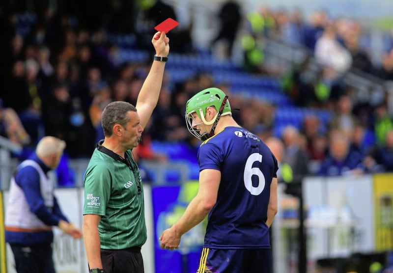 Wexford&#39;s Matthew O&#39;Hanlon gets a red card after an altercation with Antrim&#39;s Neil McManus Picture: Seamus Loughran 