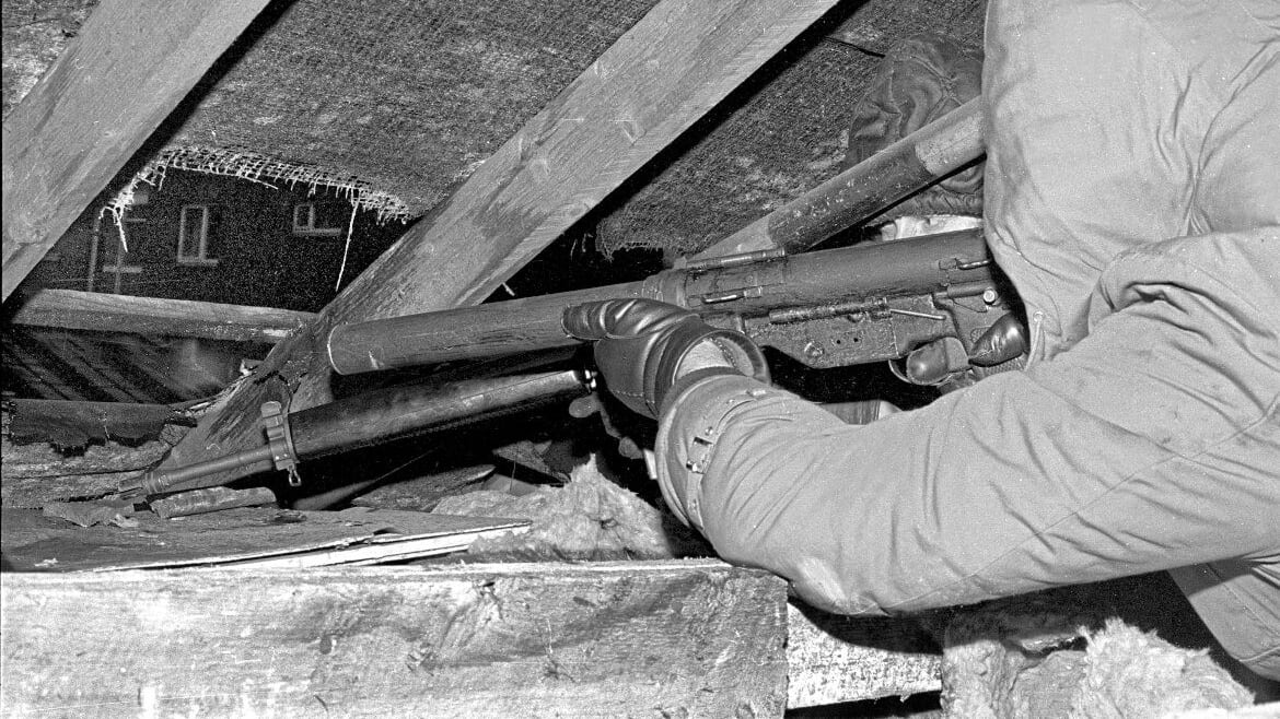 An Official IRA unit in the roof space of a house in Andersonstown, west Belfast, in 1974 