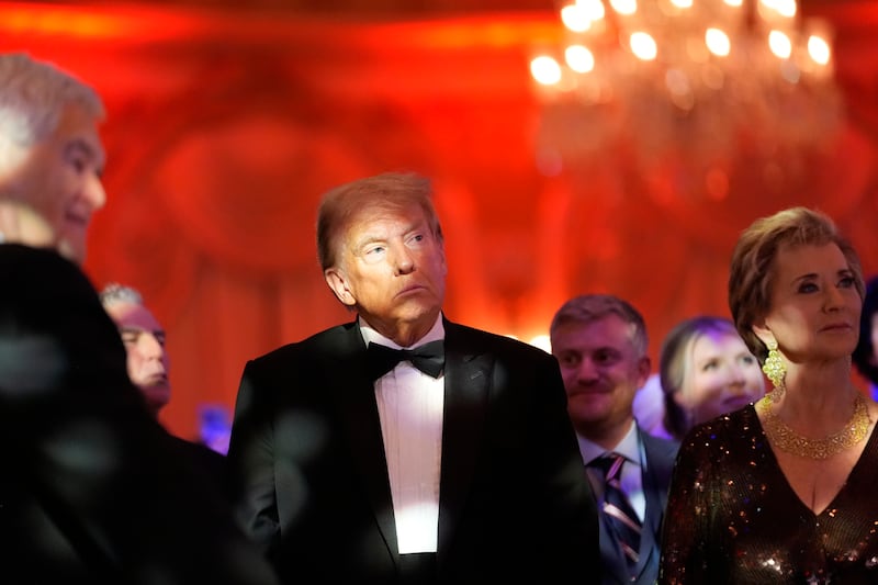 President-elect Donald Trump listens during an America First Policy Institute gala at his Mar-a-Lago estate (Alex Brandon/AP)