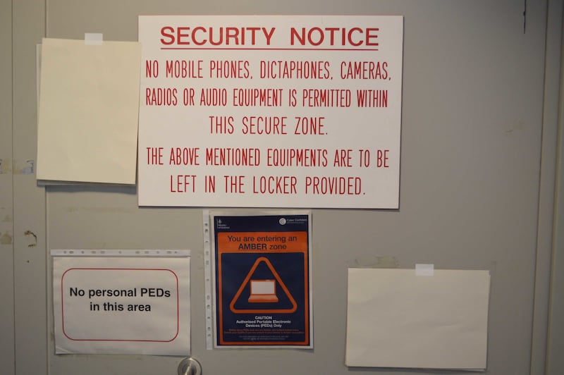 Signs on the door of a secure area at Khalife’s barracks