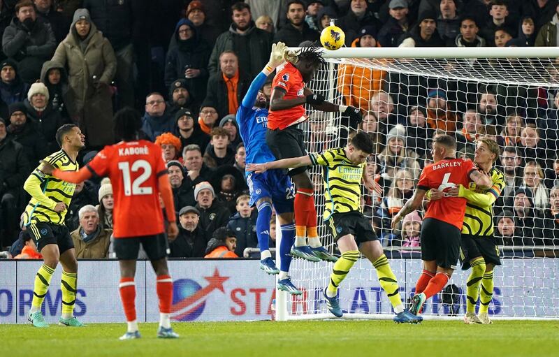 Elijah Adebayo, centre, scores Luton’s second goal