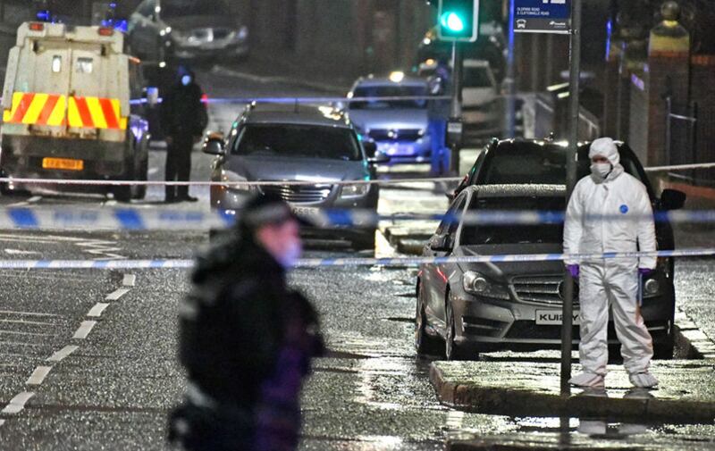 Police at the scene of a fatal shooting tonight on the Cliftonville Road in north Belfast. Picture by Alan Lewis