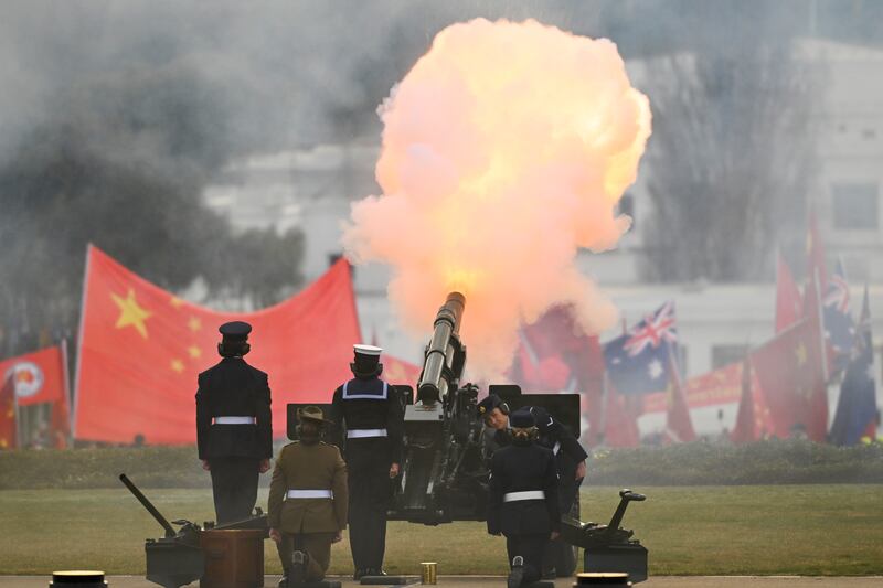 A gun salute as Chinese Premier Li Qiang inspects a guard of honor outside Parliament House in Canberra (Lukas Coch/AP)
