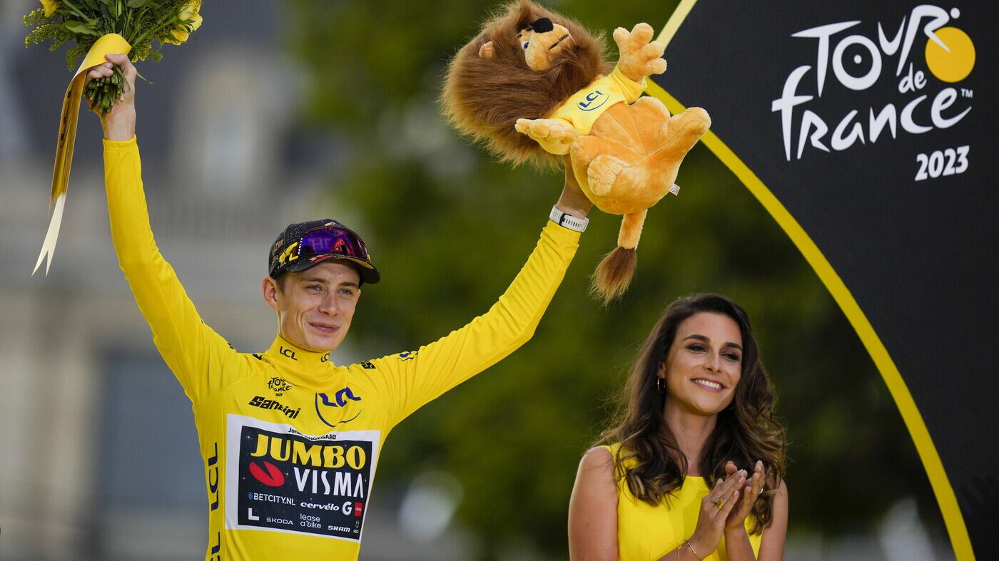 Tour de France winner Jonas Vingegaard celebrates on the podium at the Champs-Elysees in Paris on Sunday            PICTURE: AP