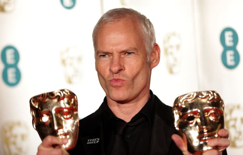 Martin McDonagh with two of his Baftas for Three Billboards Outside Ebbing, Missouri (Yui Mok/PA)