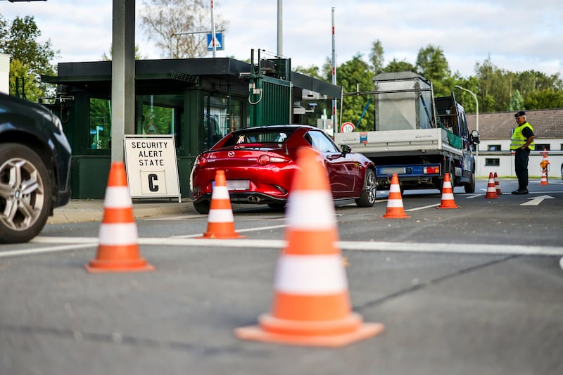 Soldiers check the entrance to the Nato air base in Geilenkirchen (Christoph Reichwein/AP)