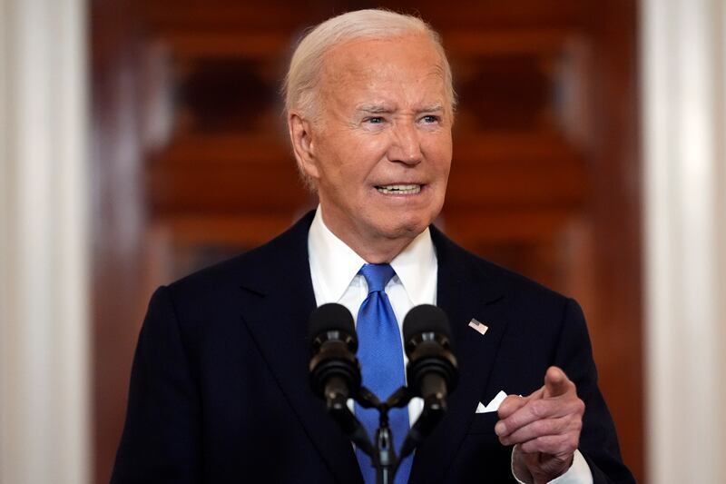 President Joe Biden speaks in the Cross Hall of the White House (Jacquelyn Martin/AP)