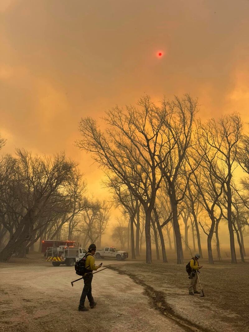 A rapidly widening Texas wildfire doubled in size on Tuesday and prompted evacuation orders in at least one small town (Flower Mound Fire Department via AP)