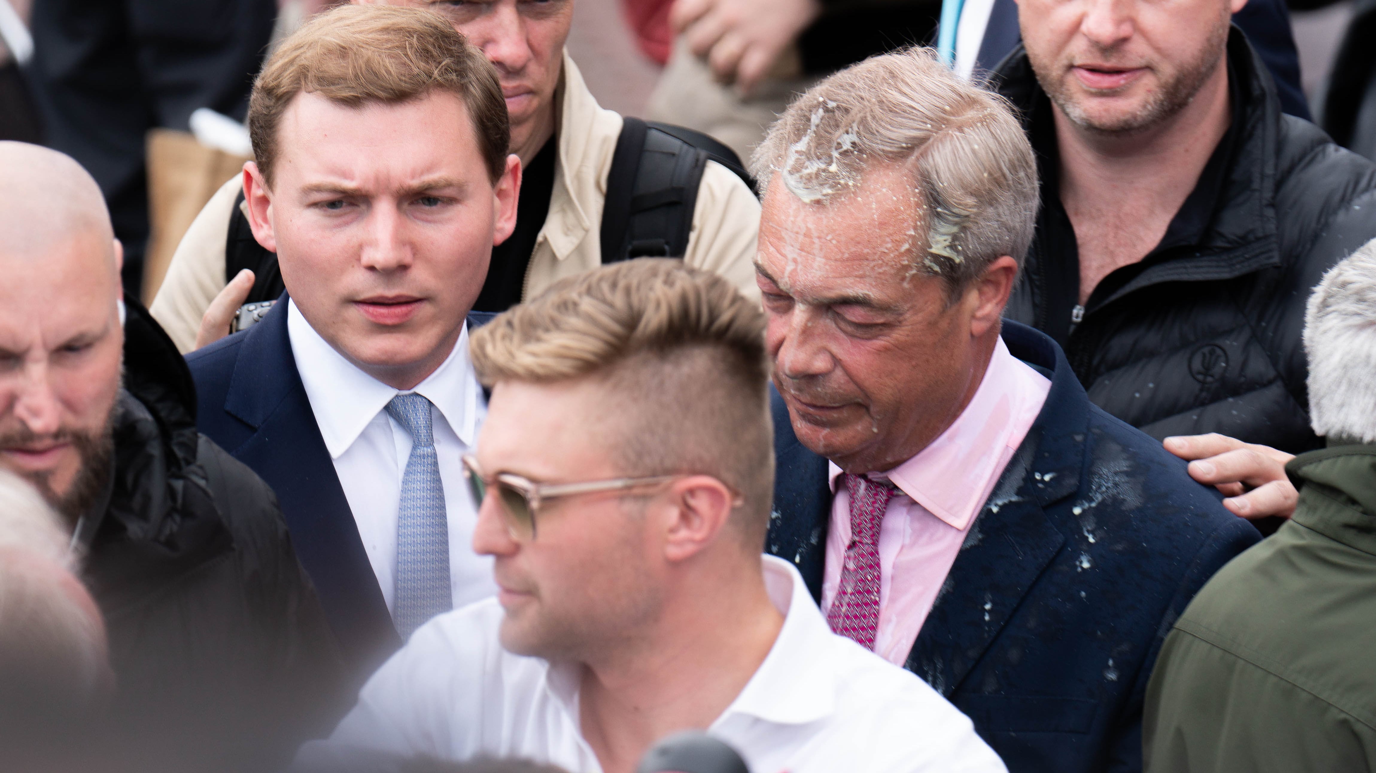 Leader of Reform UK Nigel Farage had a milkshake thrown over him as he left the Moon and Starfish pub after launching his General Election campaign in Clacton-on-Sea, Essex
