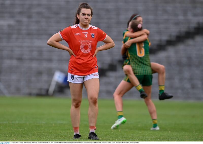 Armagh’s Clodagh McCambridge stands dejected as Meath players celebrate their win over the Orchard county in the All-Ireland SFC quarter-final two years ago. Armagh also lost at the last-eight stage last year, to Kerry, but hope to bury the memories of those defeats when Cork travel to the BOX-IT Athletic Grounds tomorrow		        Picture: Sportsfile