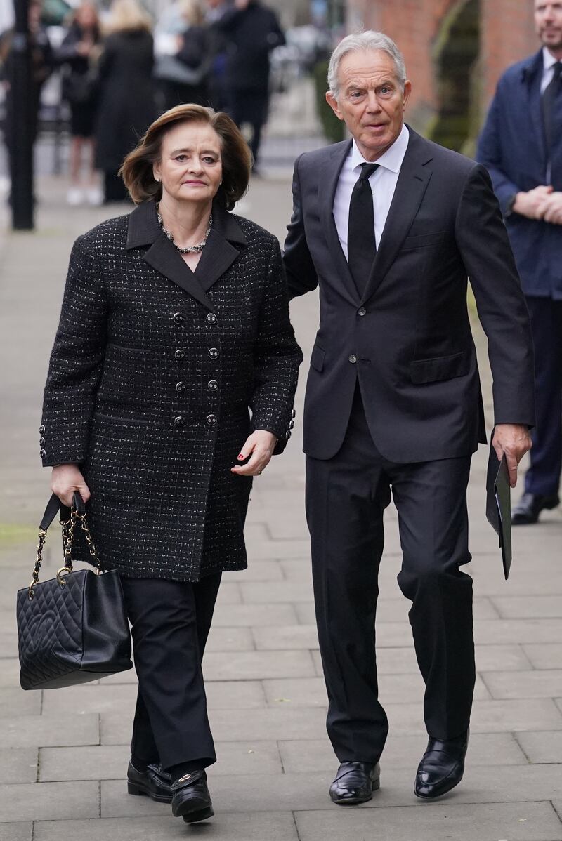 Former prime minister Sir Tony Blair and his wife Cherie attend Derek Draper’s funeral