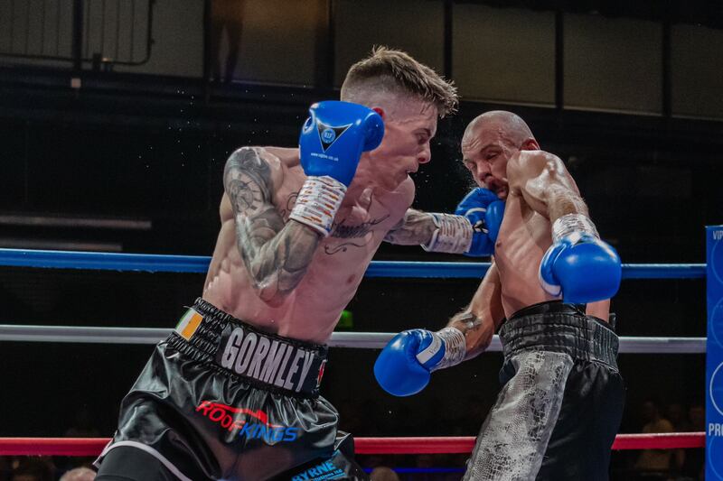 Lee Gormley lands a left hook during his professional debut win in June. Picture:  Phil Hill (Pips Photography)