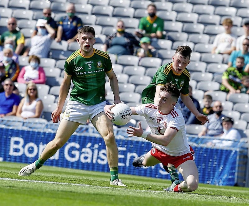 Tyrone's Eoin McElholm under pressure during the Electric Ireland GAA Football All-Ireland Minor Championship final between Tyrone and Meath at Croke Park Dublin on 08-28-2021. Pic Philip Walsh. 