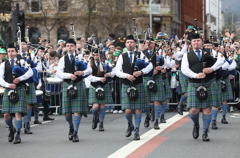 Performers entertain the crowd as  Thousands line the streets for the St Patrick’s day Parade in Belfast on Sunday.
PICTURE COLM LENAGHAN