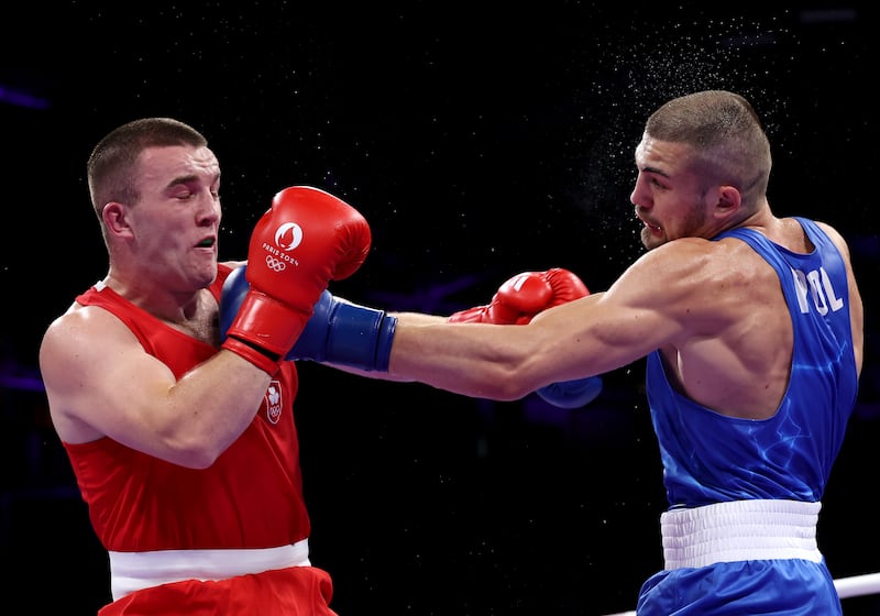 Mateusz Bereznicki lands a left hand on Jack Marley during Sunday night's last 16 clash. Picture by Getty Images