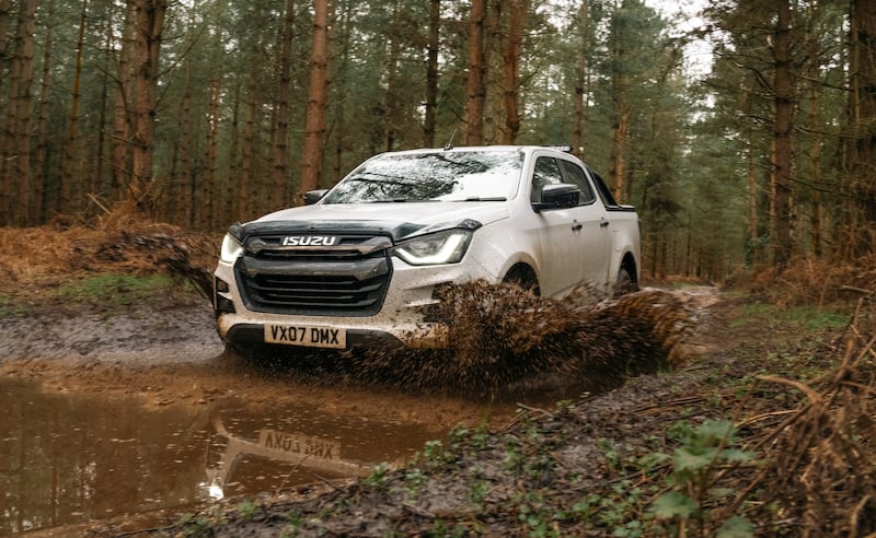 An Isuzu D-Max in the mud