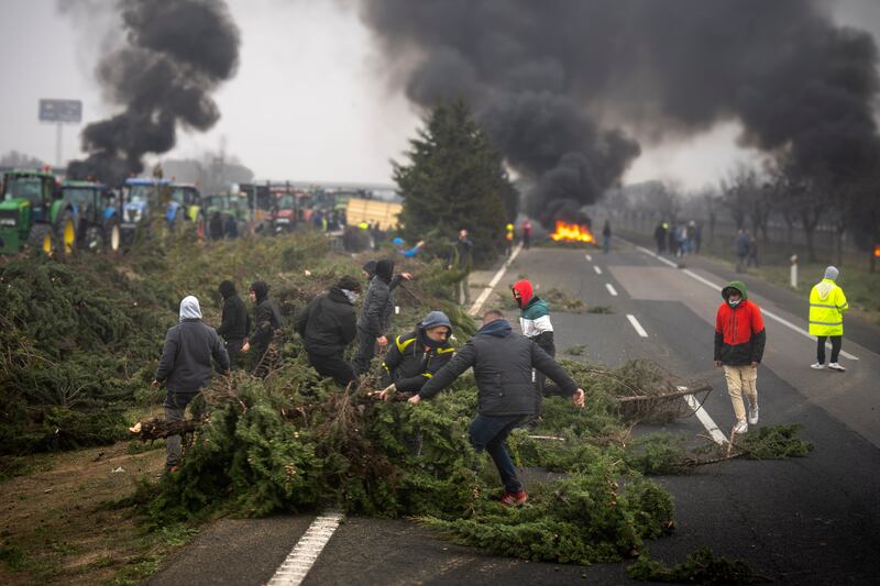 The protests involved several thousand people on tractors and in other vehicles (Emilio Morenatti/AP)