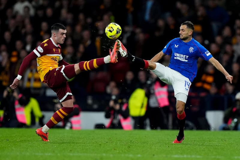 Lennon Miller (left) in action against Rangers