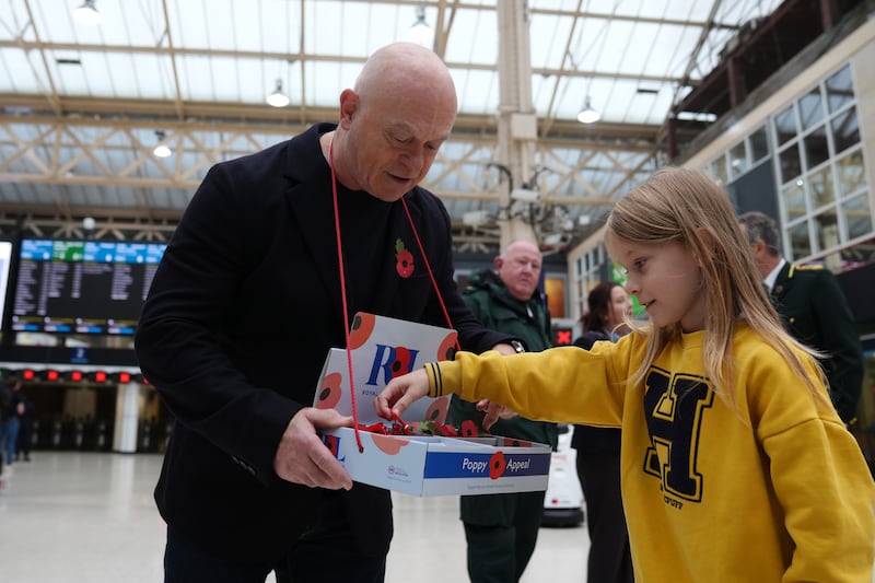 Ross Kemp selling poppies at Charing Cross Station