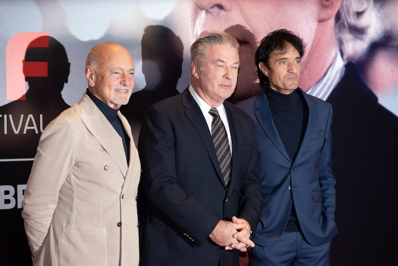 Enzo Ghigo, actor Alec Baldwin and director Giulio Base pose for a photo, at the 42nd Turin Film Festival (Matteo Secci/LaPresse via AP)