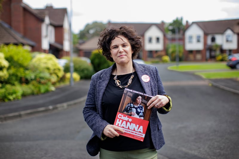 Claire Hanna, SDLP Westminster candidate for the constituency of South Belfast and Mid Down in Northern Ireland, canvassing in Carryduff. Picture date: Monday June 10, 2024. PA Photo. See PA story POLITICS Election UlsterSouthBelfast. Photo credit should read: Liam McBurney/PA Wire