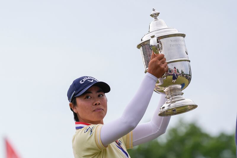 Yuka Saso holds the trophy after winning the US Women’s Open for the second time (Matt Rourke/AP)