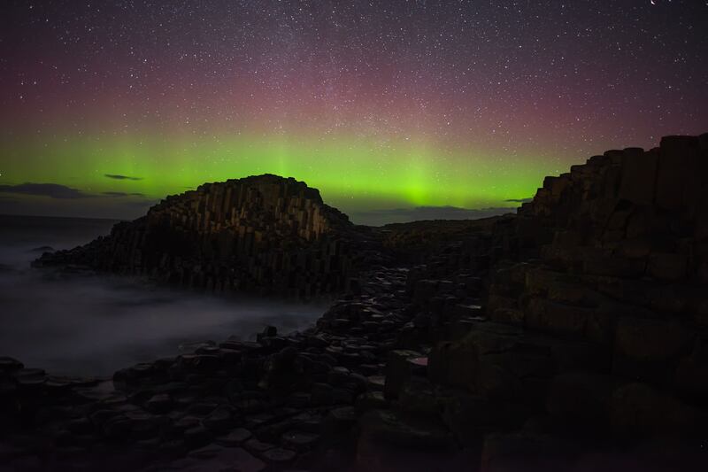 The Northern Lights over the Giant’s Causeway in Northern Ireland