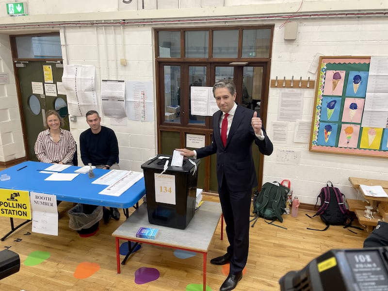 Taoiseach Simon Harris votes at the polling station at Delgany National School in Co Wicklow