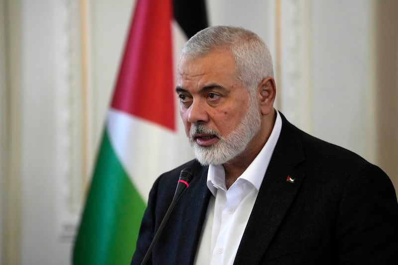 Hamas chief Ismail Haniyeh is one of the three Hamas leaders named in an application for arrest warrants from the ICC (Vahid Salemi/AP)