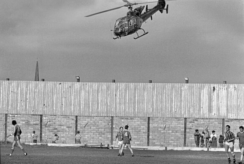 October 1986.   Bird&#39;s eye view...... When Armagh beat Kerry in the All-Ireland final 2002, the defeated manager was asked how they lost. he told a reporter Armagh hadn&#39;t beat them- thirty years of helicopters had beat them . I knew what he meant. Crossmaglen Rangers pitch was at the centre of a long running controversy. Because the British Army occupied part of the ground. As I covered this match the chopper went straight up and right over the pitch. The players did not seem to notice. 