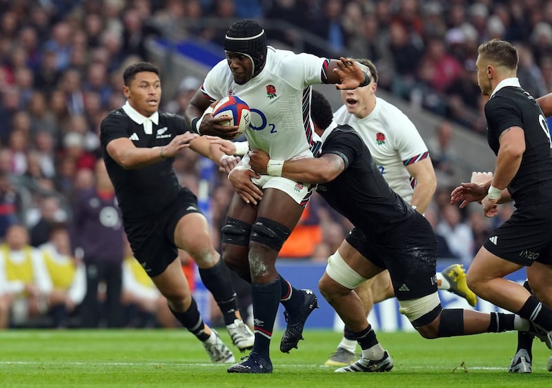 Maro Itoje carries the ball into New Zealand’s defence at Twickenham