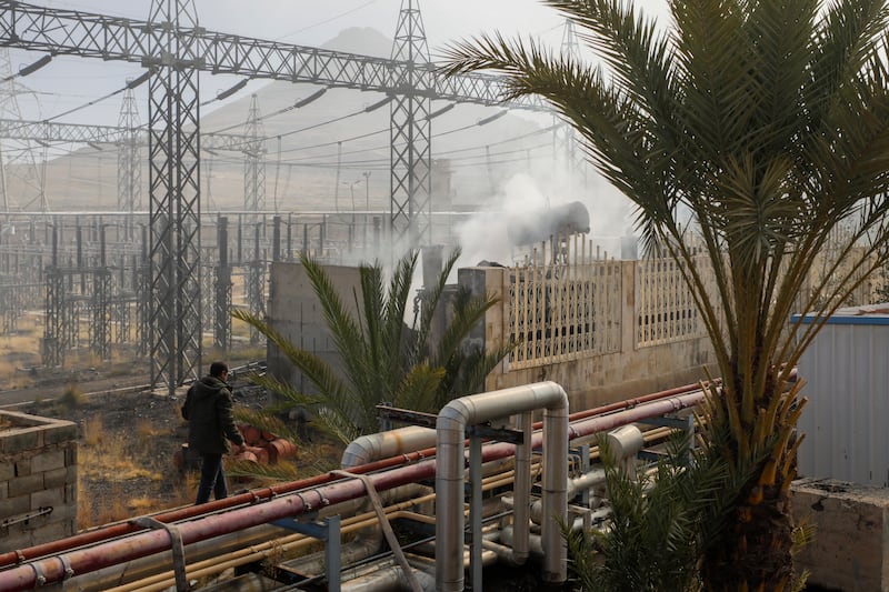 Smoke rises from the scene of an Israeli air strike in Yemen (Osamah Abdulrahman/AP)