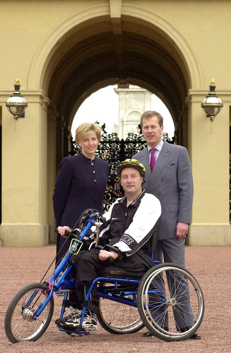 The then Countess of Wessex – now Duchess of Edinburgh – with Lord Ivar Mountbatten and tetraplegic cyclist Steve Osborne in 2002