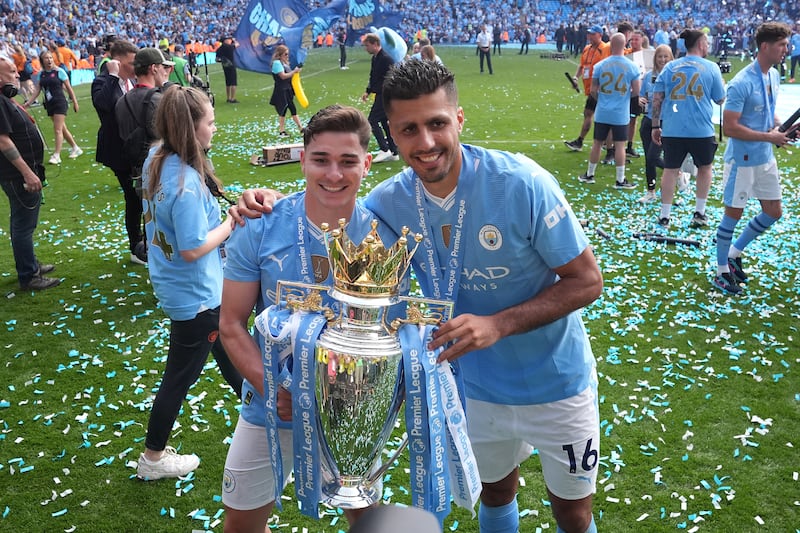 Julian Alvarez, left, is set to leave Manchester City and join Atletico Madrid