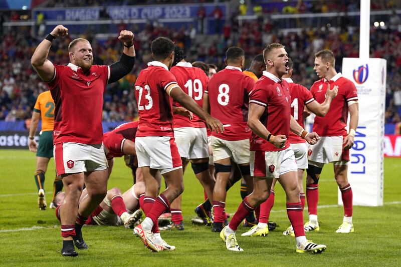 Wales players celebrate after beating Australia in the 2023 World Cup