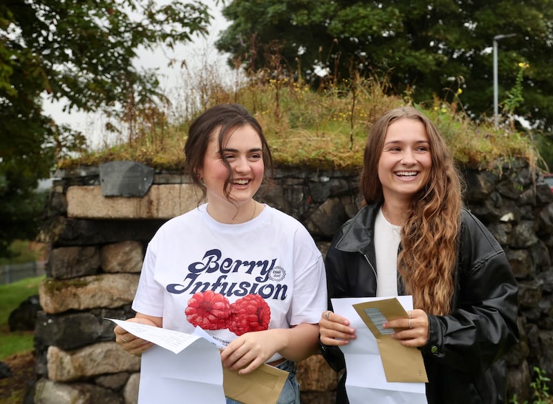 Anna-Marie Culleton  and Jodie McCracken from Colaiste Feirste receive their A Level results.
PICTURE COLM LENAGHAN