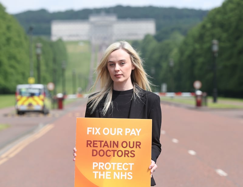 Fiona Griffin, chair for BMA NI  at Stormont in Belfast  in a dispute over pay.
The 48-hour full walkout runs from 07:00 BST on Thursday 6 June until 07:00 on Saturday 8 June.
PICTURE COLM LENAGHAN