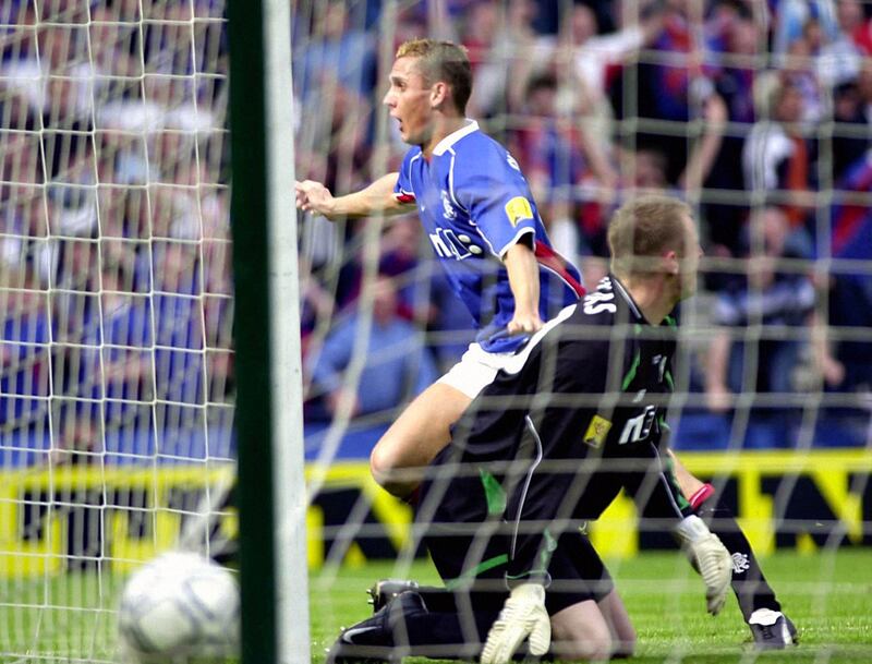 Peter Lovenkrands was on target as Rangers beat Celtic 3-2 in 2002