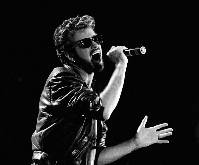 George Michael, who died on Christmas Day in 2016, is pictured on stage performing during the Live Aid Concert