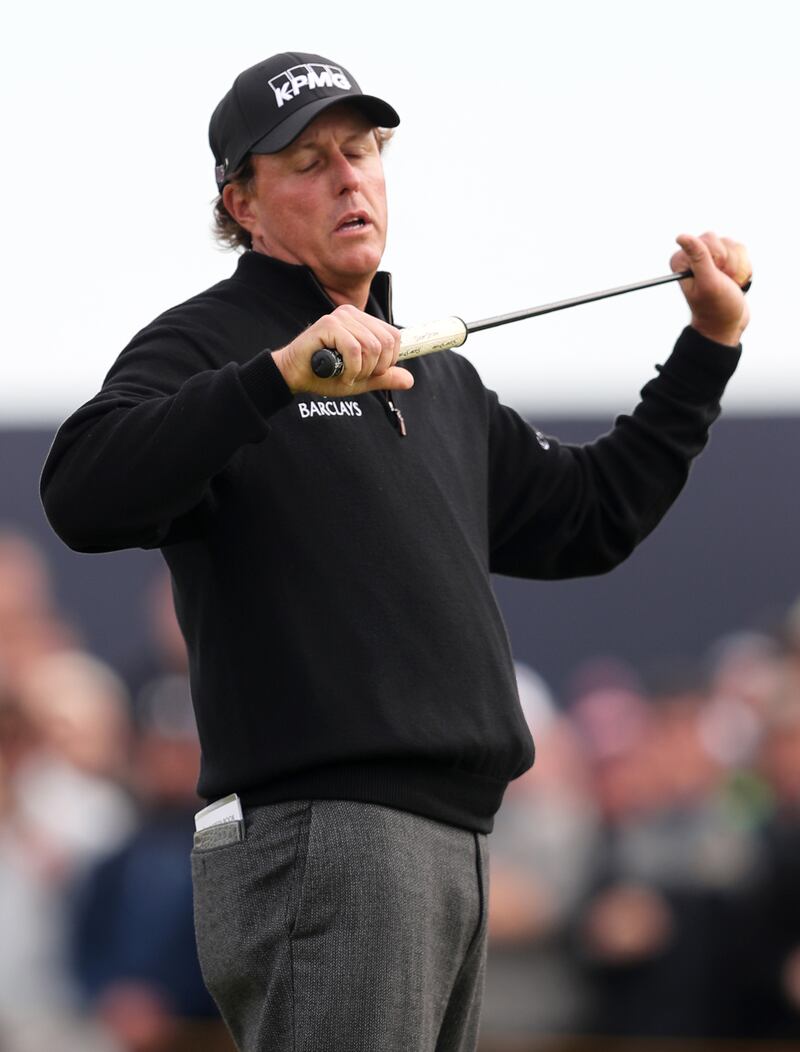 Phil Mickelson looks dejected after missing the chance for an eagle on the 15th hole in the final round of the 2016 Open