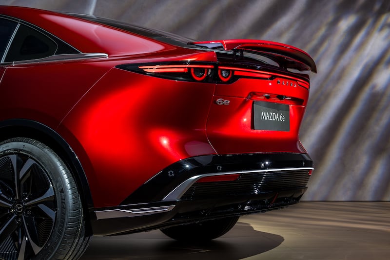 The Mazda 6e features an extendable spoiler